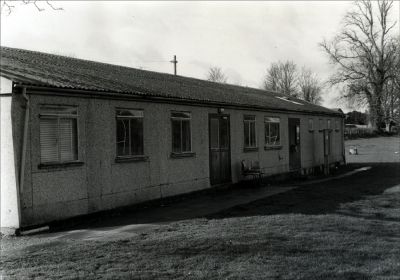 02HS001_01
An early photo of Overton Recreation Centre premises at Town Meadow. Colonel and Mrs Hoare of Southington House granted a lease on Town Meadow in 1973 and gave their agreement for the erection of a building which was completed in 1975. This included facilities for the Scouts and Guides. 

From Tim Clark / ORC
