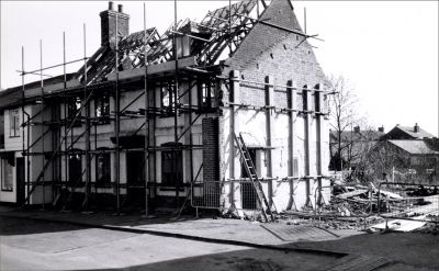 03_1WS011_2
This part of the Co-op site was the manager's house. The facade was retained as part of the 1987 redevelopment so as to be in keeping with other buildings in Winchester Street. The inside ground floor of the former house was given over to retail space. 

From Brian Burgess
