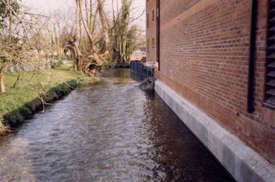 04TM01_05_02
May 1988 - this shows the stream which flows along the north side of the mill; and part of the new residential block and garages beneath the manager's flat 

By Brian Burgess
