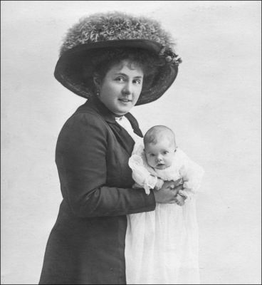 04TM03_05_08_01
The next dozen or so pictures of Katie's family were not taken in Overton but they have been included because they are excellent examples of studio photography c. 1920s/1930s. Katie was born in Jesmond, Newcastle-upon-Tyne. This photo shows her mother and sister Mary. Katie remembers that her mother was passionate about hats. 

From Katie Burmester
