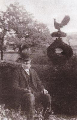 05_1CR002_1_1
This shows Robert Purdue again - probably a little later in life, possibly c.1890. It also shows a piece of topiary with a "bird" on top. A later version of this can be seen in the 2nd picture in this gallery which was taken in 1925. 

Peter Readings
