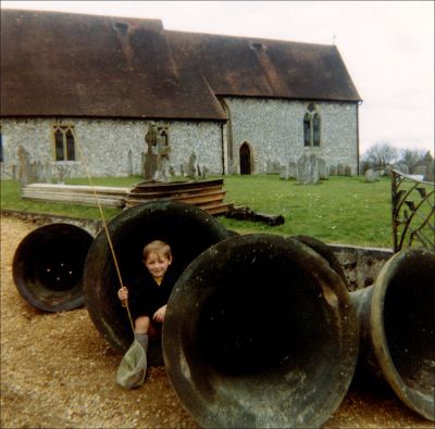 05_1CR003_16
The church bells were taken away to London for restoration (two were recast) and re-hung c.1965. Young Robert Gunn (after a fishing trip down The Lynch?) poses for his photograph. 

From Mary Gunn
