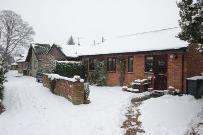 05_2BSCT_003
Chinatown in snow in February 2009, with all the old huts replaced. I should mention that although a few of the older inhabitants of the village might still refer to Chinatown, its postal address is Bridge Street. 

By Tony Morris
