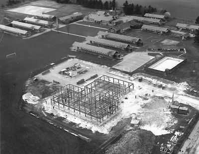 05_3CD002_1_04
The old wartime huts still house the school but a modern building is under construction - 1967 

From the School
