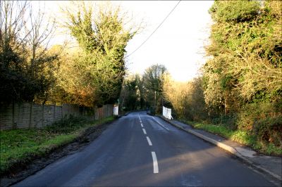 08_2QH002_05
Station Road going past Quidhampton Mill, but the view of the mill is obscured by bushes - 2005 

By Tony Morris
