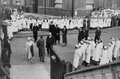 09PO025_2
With the workers turned out to say goodbye, the King and Queen at the end of their visit. The photographer was standing on the railway footbridge 

From Mary Gunn
