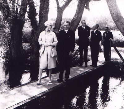 09PO033_8_10_06
Crossing the footbridge over the River Test below Bere Mill, The Queen and Sir Francis Portal, followed by Lord Ashburton, Viscount Monck and Mr J C Marsden 

From Janice Stott
