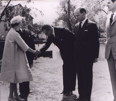 09PO033_8_10_07
Mr P W Matthews, Overseas Sales Manager, Major N S Kearsley & Mr D F Pugh are presented to The Queen 

From Janice Stott
