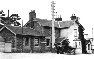 10_2TR001
Overton Station c.1912. The railway was opened in 1854. The station buildings were demolished in 1969 following the Beeching Report. In the early days there was a pub called the Railway Arms. Note the tall pole for carrying telephone wires. 

From The Greyhound public house & Jim Stickland
