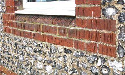 10_3RL009_2
Marks on the brickwork of the old school where children sharpened their slate pencils 

By Tony Morris
