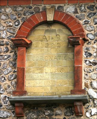 10_3RL010_2
A plaque on the front wall of Coronation Villas is dated 1902. The initials AB are thought to refer to Albert Bartlet, a local builder - or possibly Albert Barnett, bricklayer, builder and farmer of Brick Kiln Farm. 

By Tony Morris
