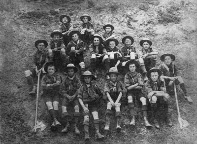 19_1SG_00_01
"Overton Scouts at camp IOW (Isle of Wight) - 1907". Front row - numbering from L to R: 1 Bert Smith, 3 Powell, 4 Stan Kercher, 6 Edwin Hayes. Middle row: 1 Bert Redstall, 4 Ern Lambden, 6 Reg Wright. The date is interesting because it is the same year as the "first" scout camp on Brownsea Island and before the publication of "Scouting for Boys". A possible explanation is that B-P was a close friend of Colonel Bertram Portal who was influential in the establishment of Scouts in Overton.

From David Clewett
