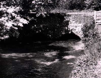 11TO024_1
This is the bridge over the Test at the bottom of Straight Lane. Ollie Kite died near here c.1970. Ollie was an expert fly fisherman and was a key figure in the TV Series "Out of Town. Presented by Jack Hargreaves it ran from 1963 to 1981. To many countryside lovers this was a "must see" series and I will never forget the theme song sung by Max Bygraves: Say what you will, the countryside is still, the only place where I could settle down. Troubles there are so much rarer, out of town. 

From Janice Stott
