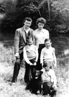 13_1SM002_11
Katie Collis had five children who are shown here in this picture taken in 1957 outside Silkmill Cottages - Brian, Jean, Bill, Vic and Susan with Prince the dog. Brian went into the army and retired to Wiltshire. Vic emigrated to Australia. Bill moved to Scotland and Susan moved to Bournemouth. Jean stayed in Overton - see previous picture. 

From Susan Broderick
