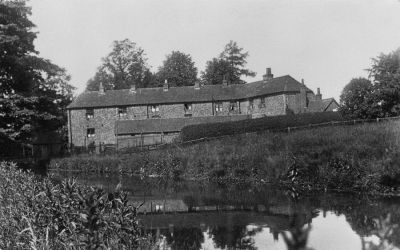 13_1SM002_03
The old mill cottages in Southington Lane viewed from the south side of the river - since demolished 

From David Bishop
