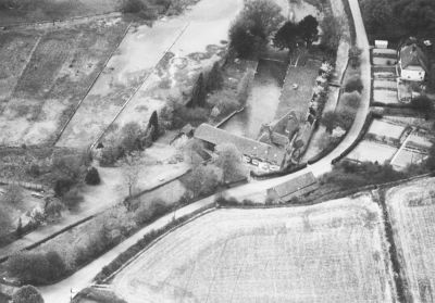 13_2TL000_00_1
1964 aerial photo of Southington Mill. At this time it no longer functioned as a mill and was a private residence. Note the derelict water cress beds on the left. These extended to the back of Parsonage Farm on the B3400 Overton to Whitchurch road 

From Peter Baker
