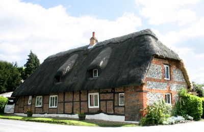 13_4ST006_3
The original Tithe Cottage was destroyed by fire some years ago but was rebuilt in similar style - photo 2005 

By Tony Morris
