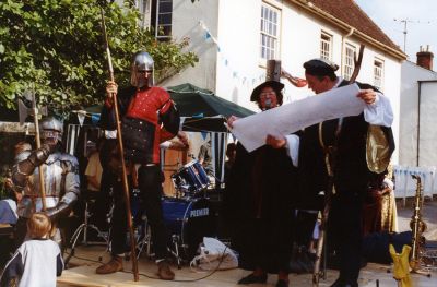 Click to view full size image
==============
15_2SF001_04
A recital? A proclamation? Tough looking bouncers.
By John Thomas
15_2SF001_04
A recital? A proclamation? Tough looking bouncers.
By John Thomas