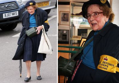 15_2SF004_1_10_04
Brenda Palmer on her way to the Fireplace Shop to talk about her wartime experiences. As indicated by her yellow insignia, Brenda served in the Civil Defence Corps Welfare during WW2 - and of course she is dutifully carrying her gas mask 

By Rayner Rudland & Tony Morris
